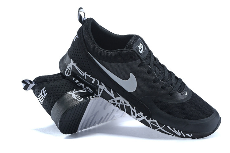 nike thea noir pas cher